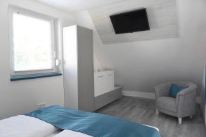 Postel nebo postele na pokoji v ubytování Bell Nyaraló Agárd