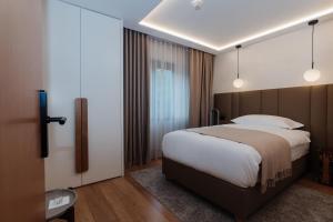 Letto o letti in una camera di Boutique Hotel Panorama