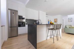 Kuchyň nebo kuchyňský kout v ubytování Los Adelantados El Patio Live Canarias