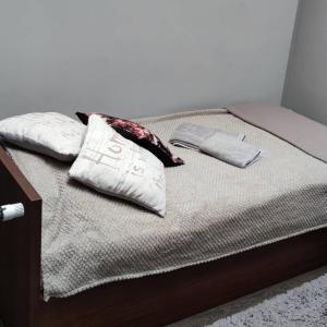 Llit o llits en una habitació de Hotelik Kościerzyna