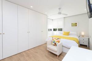 Posteľ alebo postele v izbe v ubytovaní Carmen Beach House in Malaga by Solaga Holiday Homes + 28 fotografií