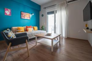 A television and/or entertainment centre at Exclusive apartment in the heart of Athens