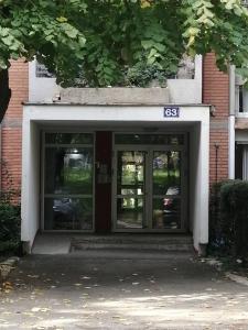 an entrance to a building with the door open at Starry Sky in Belgrade