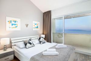 Posteľ alebo postele v izbe v ubytovaní Villa Morčić with a sea view - Rijeka