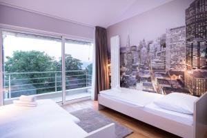 Posteľ alebo postele v izbe v ubytovaní Villa Morčić with a sea view - Rijeka + 25 fotografií