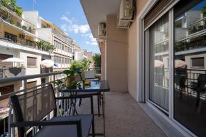 A balcony or terrace at Exclusive apartment in the heart of Athens
