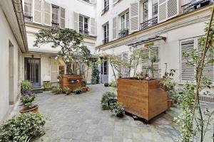Vonkajšia záhrada v ubytovaní Pick A Flat's Apartment in Opéra - Rue Saulnier