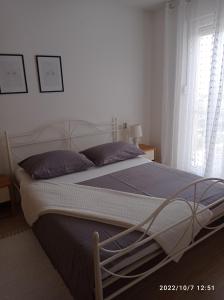 Postel nebo postele na pokoji v ubytování Love Split