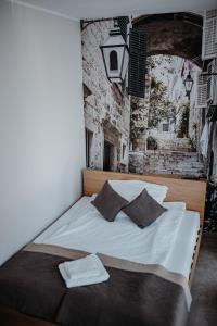Кровать или кровати в номере Dom Weselny Ludmiła