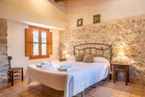 Giường trong phòng chung tại Finca Marina Pollença +17 ảnh