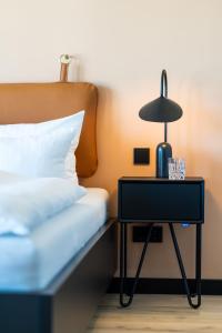 Black F Tower - Serviced Apartments客房内的一张或多张床位