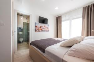 Posteľ alebo postele v izbe v ubytovaní Villa Vanna + 25 fotografií