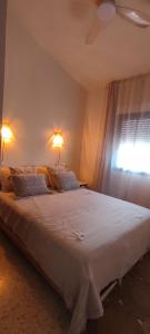 Postel nebo postele na pokoji v ubytování Casa eucalyptus moraira + 37 fotografií