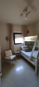 Postel nebo postele na pokoji v ubytování Casa eucalyptus moraira