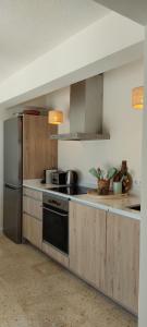 Kuchyň nebo kuchyňský kout v ubytování Casa eucalyptus moraira
