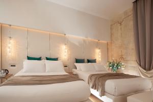 Cama o camas de una habitación en Argentina Residenza