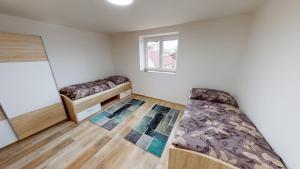 Apartmány U Mirase客房内的一张或多张床位