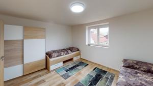 Apartmány U Mirase客房内的一张或多张床位