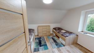 Apartmány U Mirase客房内的一张或多张床位