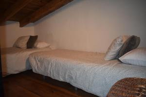 Postel nebo postele na pokoji v ubytování Casa Rústica Charco del Viento