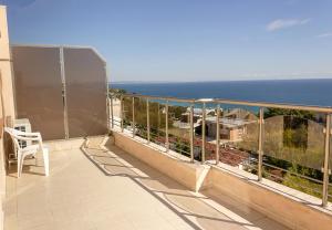 a balcony with a view of the ocean at Spacious 3BD Flat with Large Terrace & Sea View in Varna City
