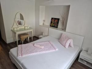 A bed or beds in a room at Apartmany St. Maria
