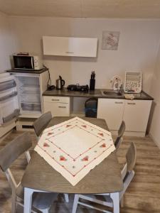 A kitchen or kitchenette at Apartmany St. Maria