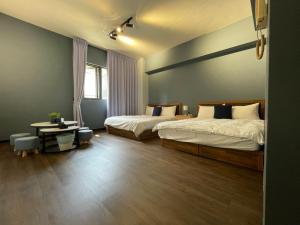 Voodi või voodid majutusasutuse Still Haus 静の宿 toas