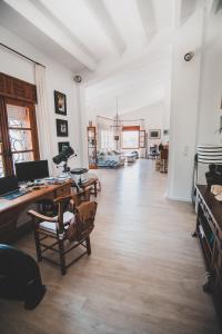 an office with a desk and a computer in a room at Casa del Canto, Calapanizo in Cuevas del Almanzora +66 photos