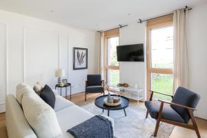 Televízia a/alebo spoločenská miestnosť v ubytovaní Ferienwohnung Rosenstrasse