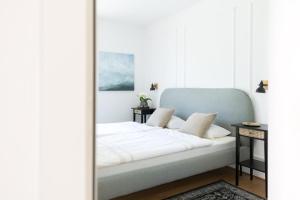 Posteľ alebo postele v izbe v ubytovaní Ferienwohnung Rosenstrasse