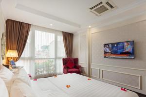 Μια τηλεόραση ή/και κέντρο ψυχαγωγίας στο Luxury Old Quarter Hotel & Gym