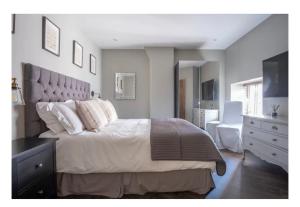 En eller flere senge i et værelse på Apartment 1, 81 Chesterfield Road