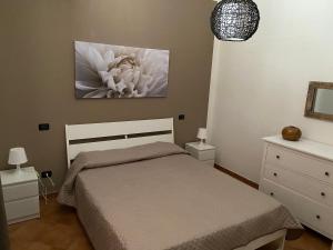 Postel nebo postele na pokoji v ubytování Villa Piruzzu CV Torre Mulinazzo app P