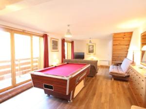 a living room with a pool table in it at Chalet Landry, 5 pièces, 12 personnes - FR-1-411-545 in Landry