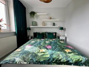 Posteľ alebo postele v izbe v ubytovaní LuxApart Kalisz New