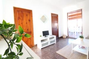 Televízia a/alebo spoločenská miestnosť v ubytovaní Global Properties, Apartamento céntrico en Canet d'en Berenguer