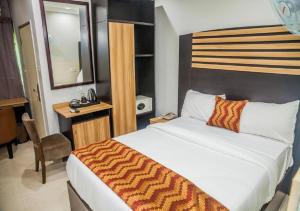 Postel nebo postele na pokoji v ubytování Hotel 61
