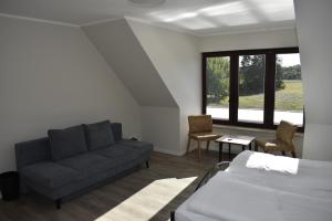 Posezení v ubytování Pension zur Schleuse GARNI am Elbe Lübeck - Kanal in Witzeeze