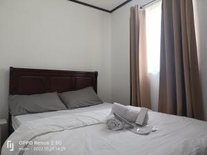 Ein Bett oder Betten in einem Zimmer der Unterkunft LJ's transient house Northridge Grove, Bria Homes, Tungkong Mangga, SJDM
