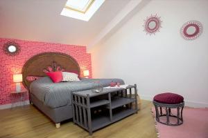 Łóżko lub łóżka w pokoju w obiekcie Les beaux châteaux