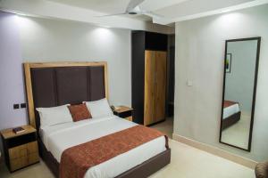 Postel nebo postele na pokoji v ubytování Hotel 61