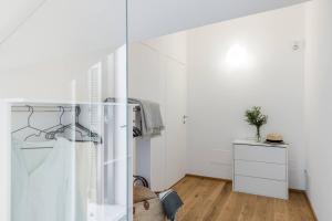 a room with white walls and a white cabinet at Ca' de Ma in Diano Marina +111 photos