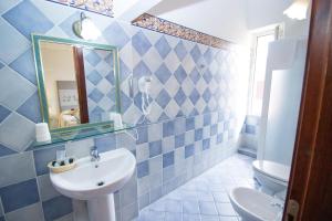 Koupelna v ubytování Hotel Canne al Vento + 37 fotografií