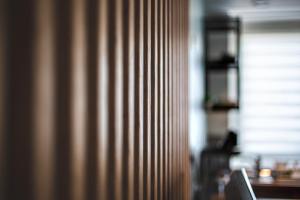 a close up of a brown curtain in a room at EASYHOME DUNKERQUE in Dunkerque