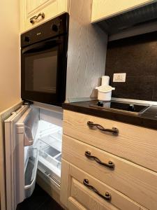 Kuchyň nebo kuchyňský kout v ubytování B&B Room Code 1