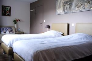Ένα ή περισσότερα κρεβάτια σε δωμάτιο στο Bed and breakfast Mentari