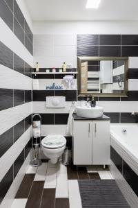 Koupelna v ubytování H29 Vivien Apartman