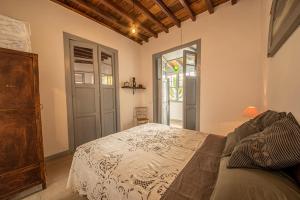 A bed or beds in a room at Mi casa es tu casa