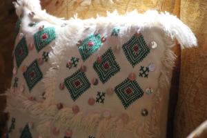 Giường trong phòng chung tại Eco-Lodge IGHAZRAN